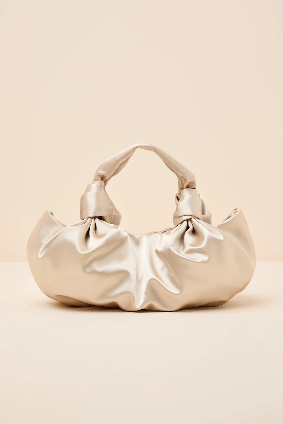 Maelynn Champagne Satin Knotted Handle Bag